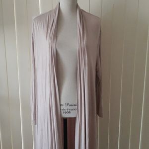 Long asymmetrical duster